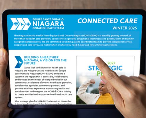 A person scrolling the Connected Care newsletter on their tablet.