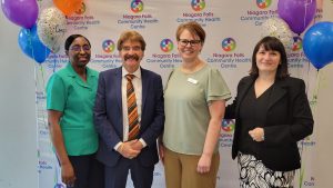 Photo of speakers from Niagara Falls Community Health Centre Primary Care Expansion. From left to right: Terica Larmond, Chair, Board of Directors, Niagara Falls Community Health Centre, Wayne Gates, MPP for Niagara Falls, Laura Blundell, Executive Director, Niagara Falls Community Health Centre, Tara Galitz, Executive Director, NOHT-ÉSON
